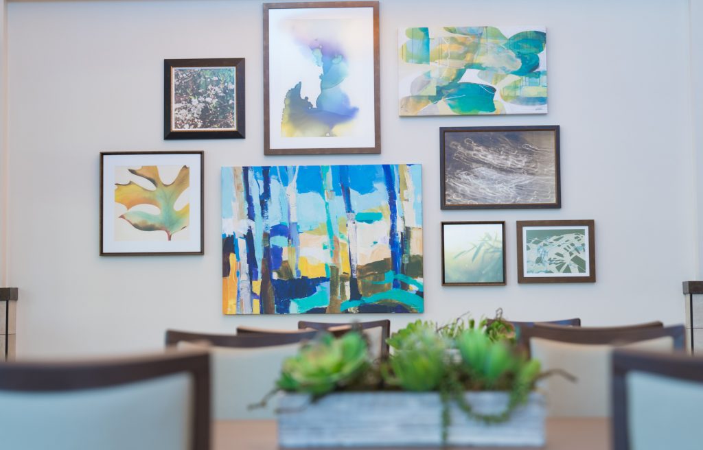 A portrait wall at BirchPointe, a nursing home and skilled nursing facility